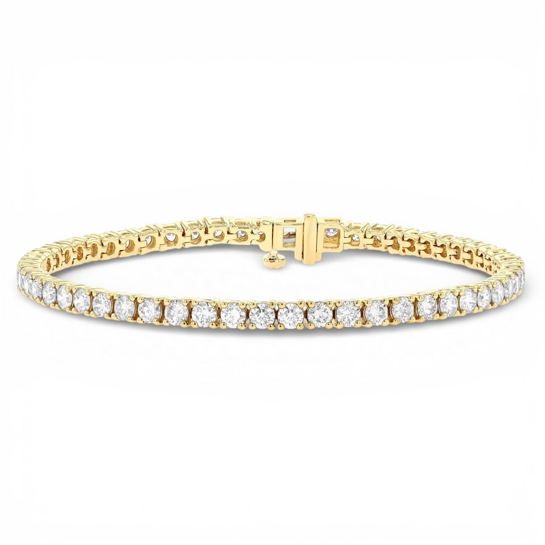 4.98 ctw Diamond 14K Yellow Gold Tennis Bracelet: Captured in a moment of brilliance, this stunning Tennis bracelet featuring White Diamond speaks to the connoisseur. The gemstones are nestled within a Continuous Line framework, supported by a substa