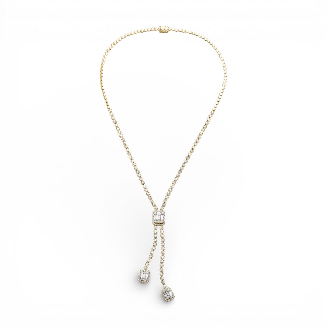 6.75 ctw Diamond 18K Yellow & White Gold Lariat Necklace: A symphony of light and color, this stunning Empress necklace featuring White Diamond embodies the pinnacle of luxury. Securely held in a classic Lariat design, the necklace is forged from 31.3 grams 