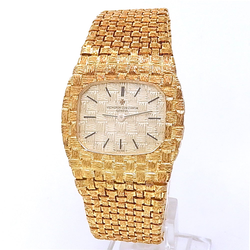 Vacheron Constantin Vintage 33020 18k Yellow Gold Interwoven Gold Dial: The Vacheron Constantin Vintage, Reference 33020, represents the pinnacle of classical elegance and artisanal craft. Sculpted in lustrous 18k yellow gold, this refined timepiece features a fascinating