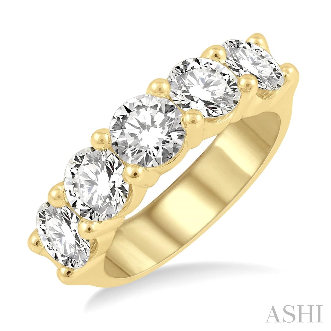 3.05 ctw Diamond 5 Stone 14K Yellow Gold Wedding Band: An exquisite masterpiece of haute joaillerie, this stunning Five Stone ring featuring White Diamond is a true treasure. Showcasing the gems in a Five-Stone arrangement, the ring consists of 6.5 grams 