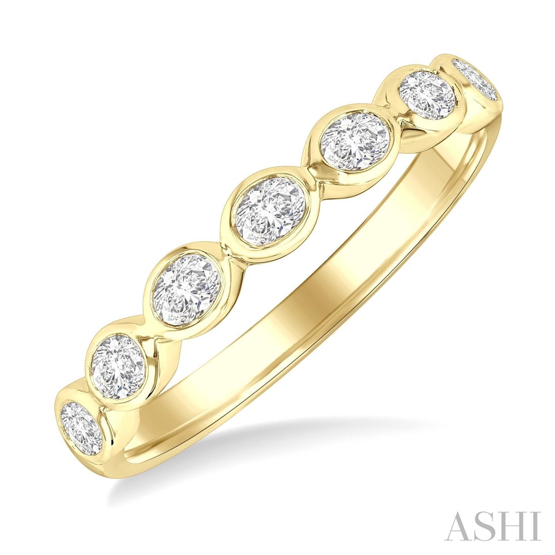 0.70 ctw Oval Cut Diamond East-West Set Bezel Stackable 14K Yellow Gold Band Ring: An exquisite masterpiece of haute joaillerie, this elegant East-West Set Oval Cut Bezel ring featuring White Diamond is a true treasure. A detailed Bezel gallery secures the stones, rendered in 2.35 g