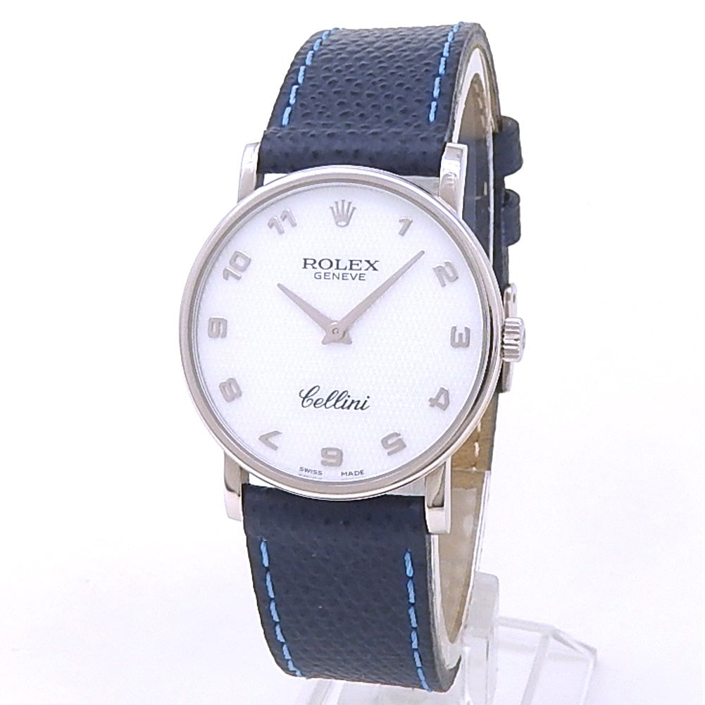 Rolex Cellini 5115 18k White Gold Mother of Pearl Dial: The Rolex Cellini, Reference 5115, is an exquisite expression of classical watchmaking elegance. Crafted in beautiful 18k white gold, this refined timepiece features a stunning, iridescent Mother of P