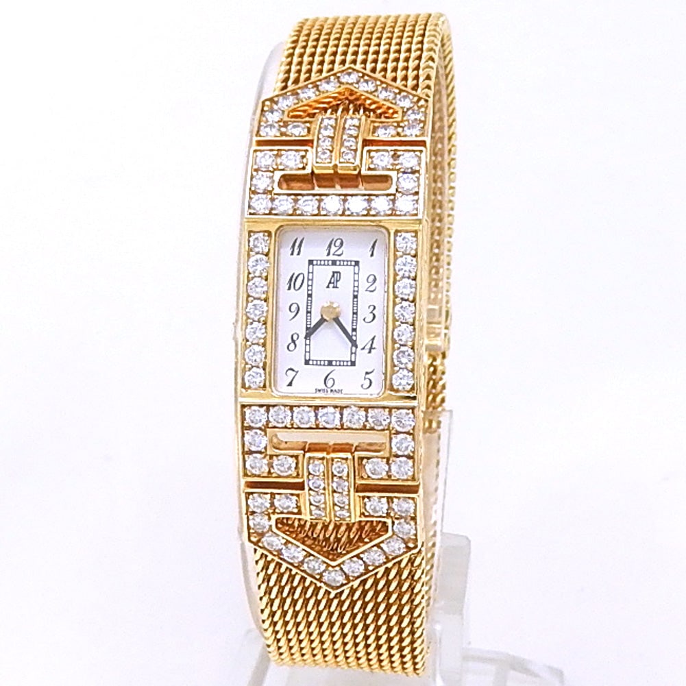 Audemars Piguet Charleston 18k Yellow Gold Diamond White Dial: The exquisite Audemars Piguet Charleston, Reference D8XXXX, is a masterful fusion of fine watchmaking and jewelry design. Beautifully crafted in lustrous 18k yellow gold, this elegant ladies' timepiec