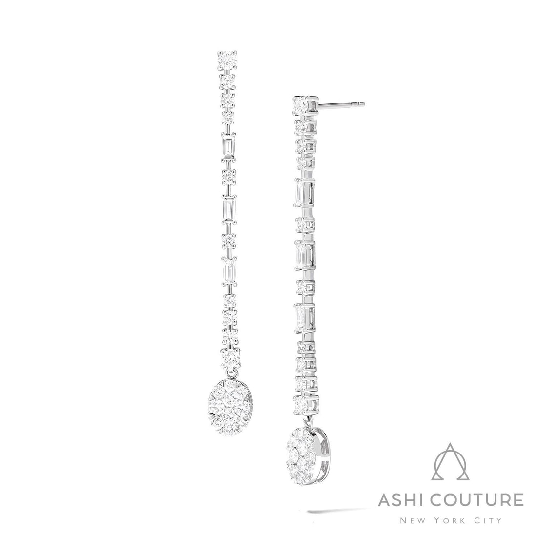 2.06 ctw Diamond Fiori Oval & Baguette Drop Cluster 18K White Gold Earrings: Captured in a moment of brilliance, this stunning Fiori Drop Cluster pair of earrings featuring White Diamonds speaks to the connoisseur. The gemstones are nestled within a Cluster framework, supporte