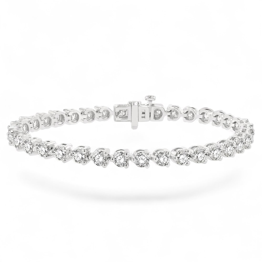 7.0 Ctw Tri-Prong Tennis Diamond Modern 14K White Gold Bracelet - Certified: A vision of luxury, this stunning Tri-Prong Tennis bracelet featuring Natural Diamonds defines sophistication. The gemstones are nestled within a Prong framework, supported by a substantial 14.65 gram