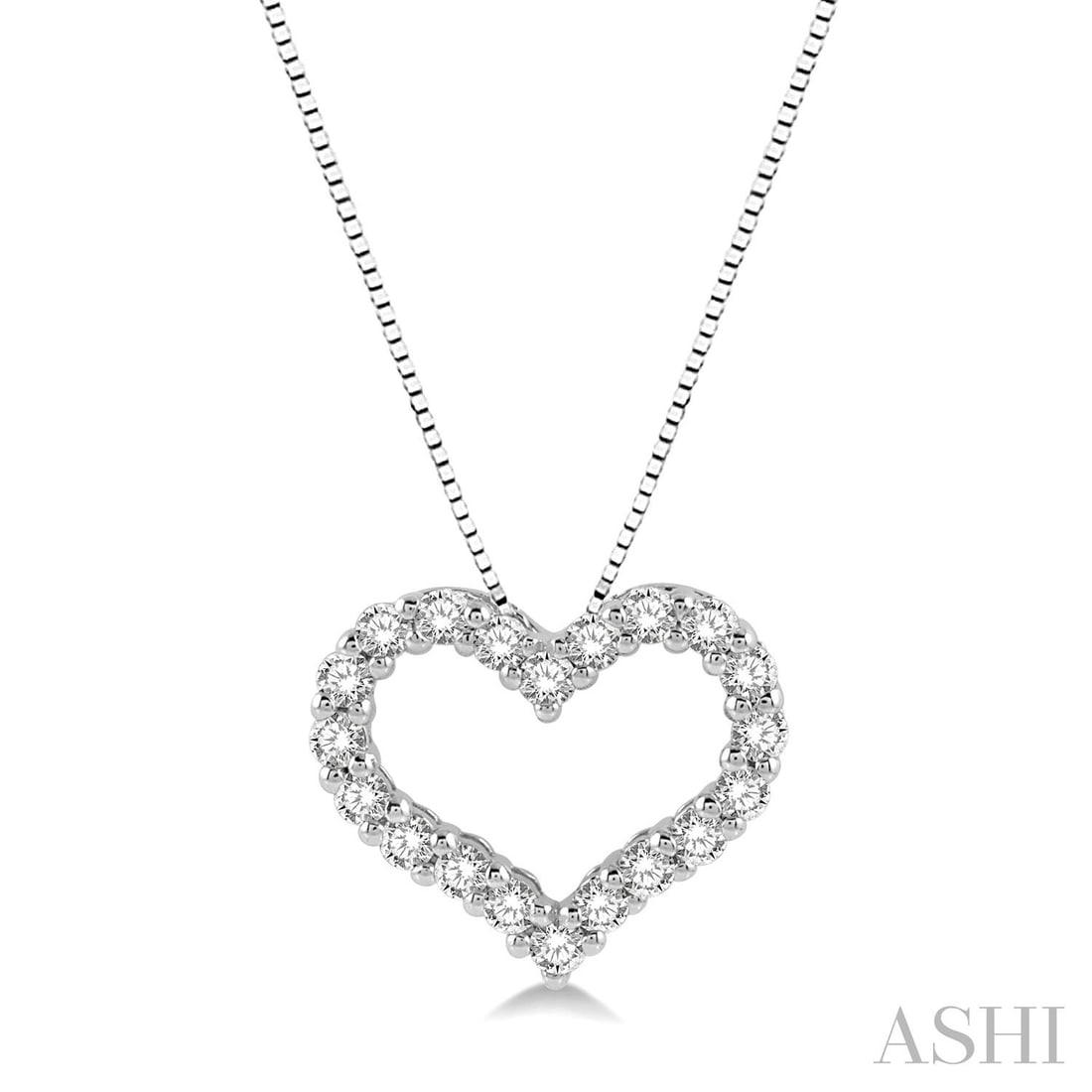 0.25 ctw Heart White Diamond 14K White Gold Pendant: Exuding opulence and grace, this elegant Heart Shape pendant featuring White Diamond is crafted for the distinguished. Crafted with precision, the Cluster setting is seamlessly integrated into 0.5 gra