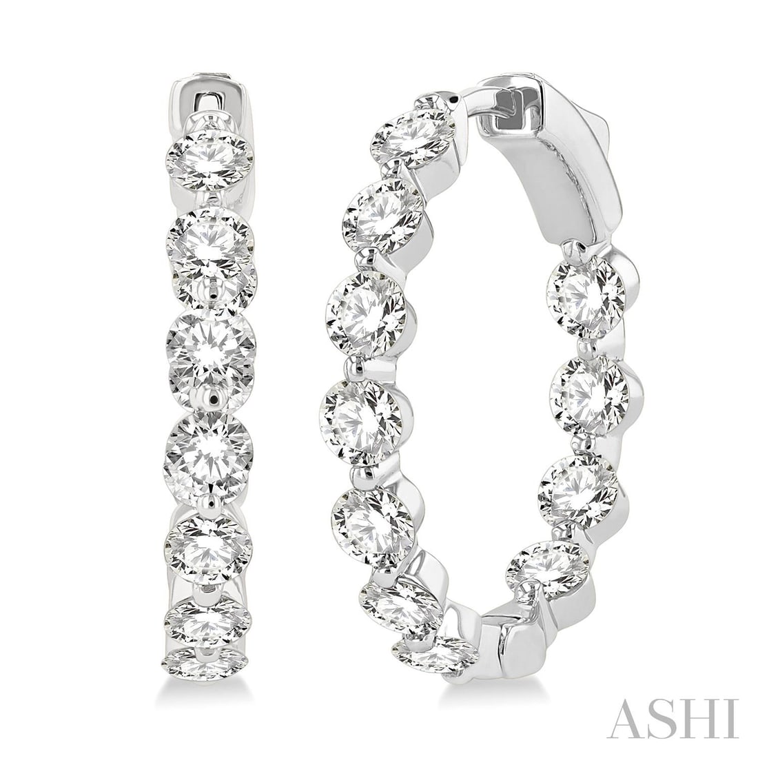 3.03 ctw Inside-Out Round Diamond 14K White Gold Hoop Earrings: Captured in a moment of brilliance, this stunning Inside-Out pair of earrings featuring White Diamond speaks to the connoisseur. Expertly mounted in a Line Setting setting, the earrings are crafted in