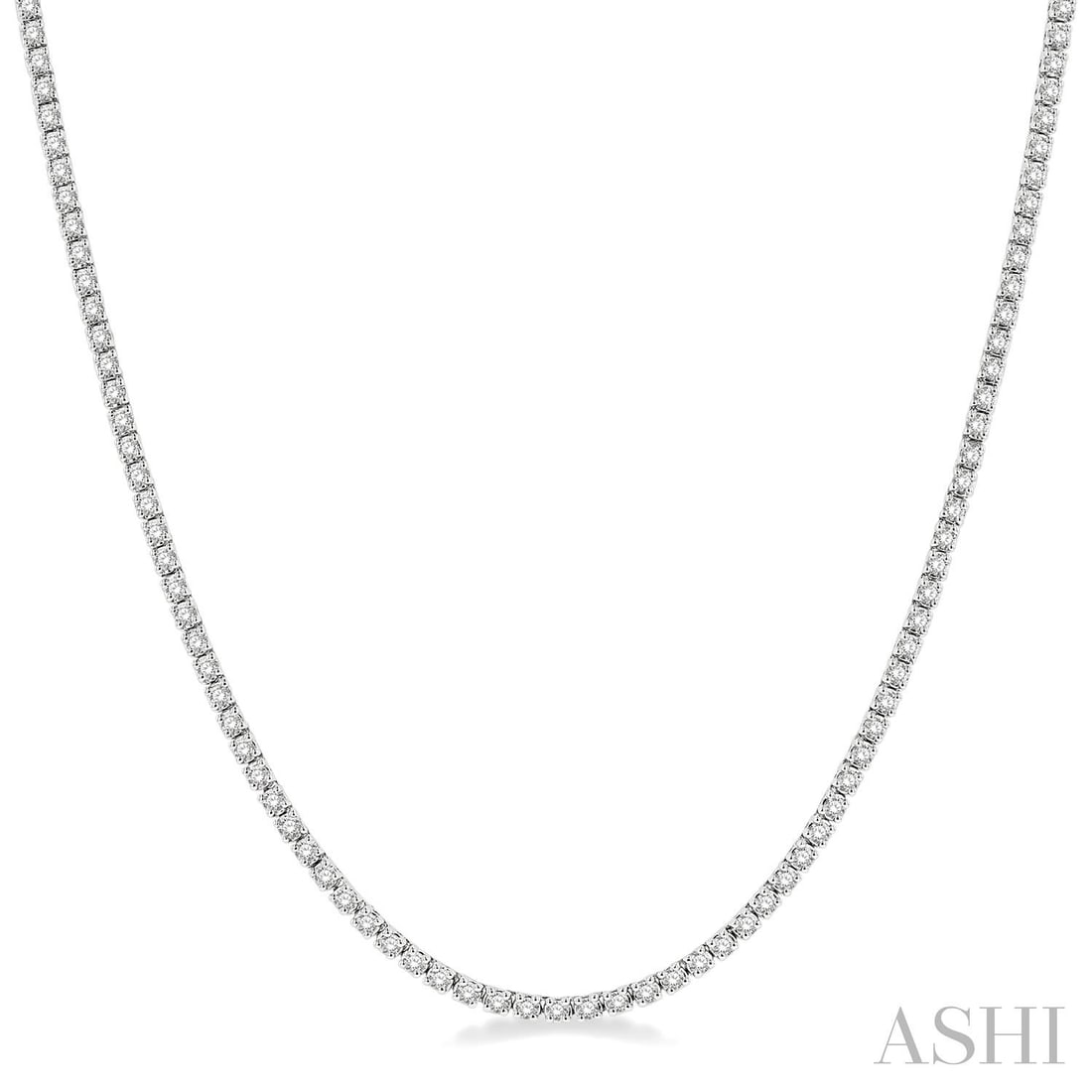 3.0 ctw White Diamond 14K White Gold Tennis Necklace: A vision of luxury, this breathtaking Tennis necklace featuring White Diamond defines sophistication. Expertly mounted in a Tennis setting, the necklace is crafted in 12.25 grams of solid 14K White Go
