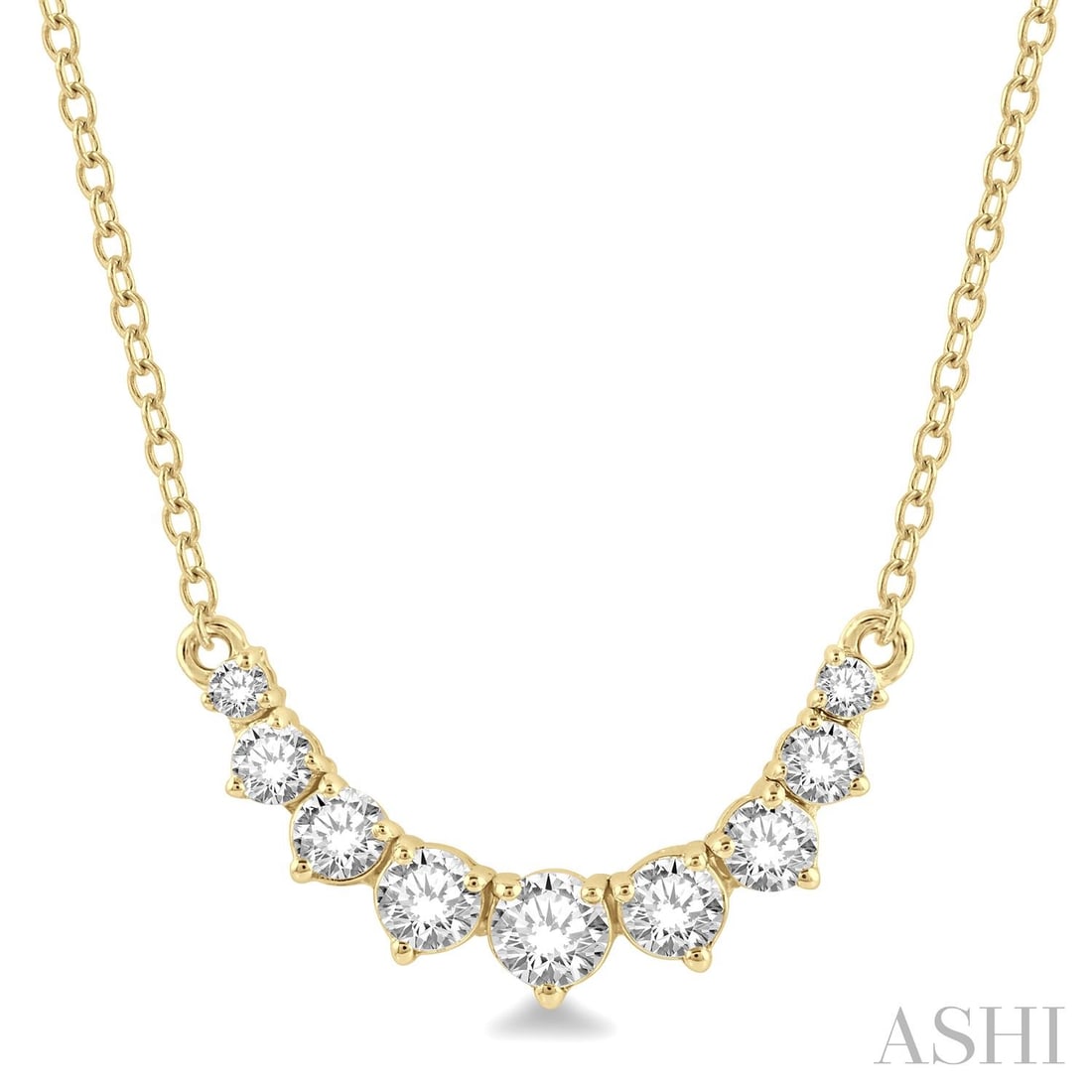 0.50 ctw Diamond Graduated Smile Necklace 14K Yellow Gold: Captured in a moment of brilliance, this elegant Smile necklace featuring White Diamond speaks to the connoisseur. The gemstones are nestled within a Fixed Drop framework, supported by a substantial 1