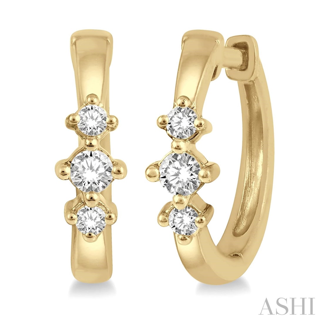 Petite Three Stone 0.15 ctw Diamond 10K Yellow Gold Huggie Earrings: A testament to superior craftsmanship, this elegant Three Stone pair of earrings featuring Natural Diamonds is unparalleled. Showcasing the gems in a Huggie Hoop arrangement, the earrings consist of 1