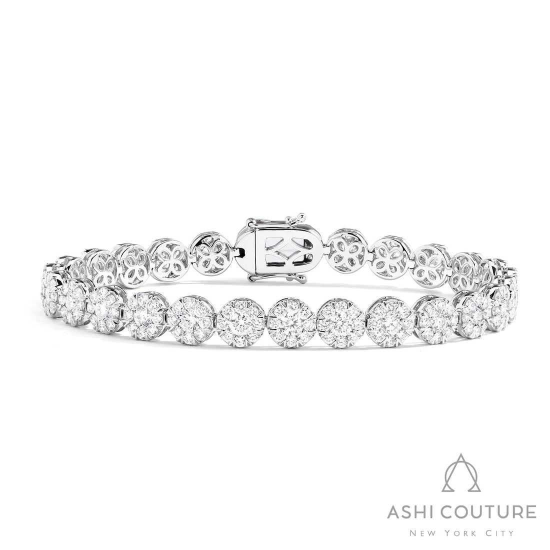 7.44 ctw Diamond 18K White Gold Tennis Bracelet: Timeless and sophisticated, this elegant Round Tennis bracelet featuring White Diamond radiates enduring beauty. Expertly mounted in a Linked Cluster Setting setting, the bracelet is crafted in 16.45 