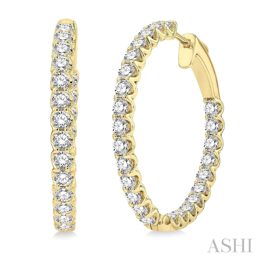 3.0 ctw Inside-Out Diamond Hoop Earrings 14K Yellow Gold: Captured in a moment of brilliance, this stunning Inside-Out Hoop pair of earrings featuring White Diamond speaks to the connoisseur. The gemstones are nestled within a Continuous Line framework, supp