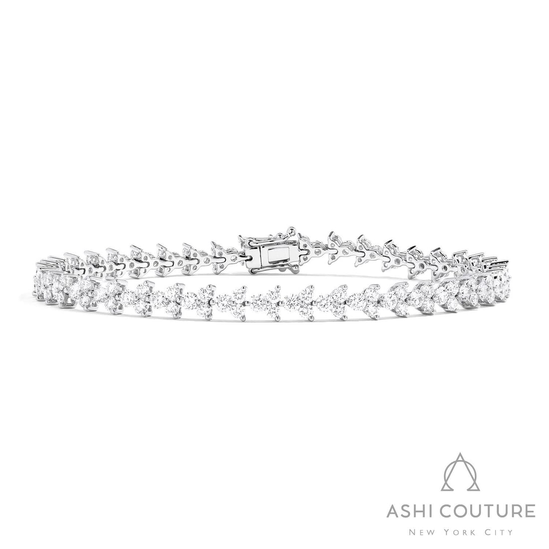3.86 ctw Duchess Graduating Arrow White Diamond 18K White Gold Bracelet: Exuding opulence and grace, this magnificent Graduating Arrow bracelet featuring White Diamond is crafted for the distinguished. A detailed Line Bracelet gallery secures the stones, rendered in 7.85 g
