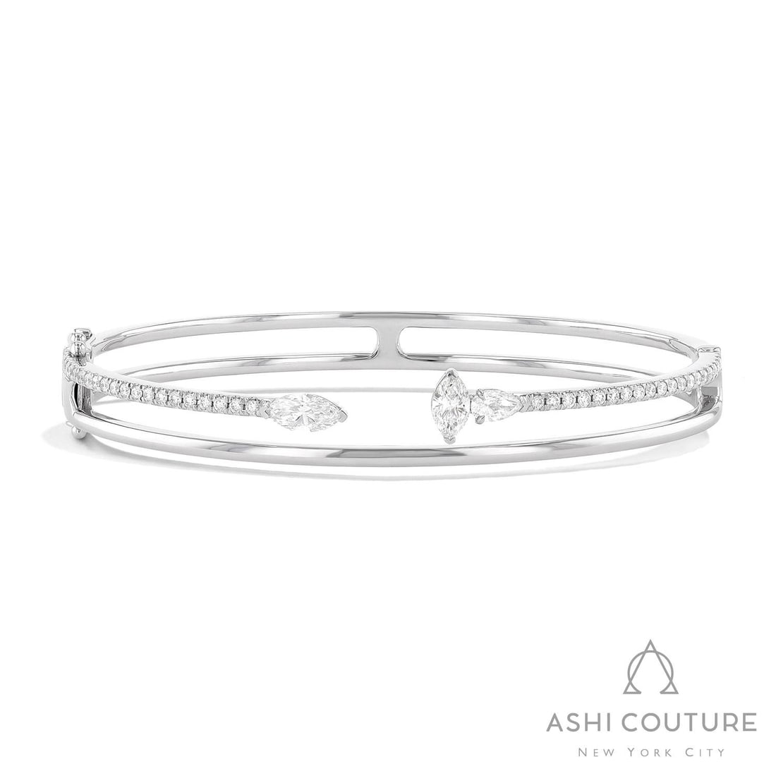 1.36 ctw Marquise Diamond Paradox 18K White Gold Bangle: Exuding opulence and grace, this magnificent Paradox 2-Row bangle bracelet featuring White Diamond is crafted for the distinguished. Crafted with precision, the Open Cuff setting is seamlessly integra