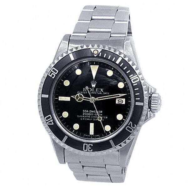 Rolex Sea-Dweller Great White 1665 Stainless Steel Black Dial: The Rolex Sea-Dweller "Great White", Reference 1665, represents a legendary milestone in the design of professional diving instruments. Masterfully constructed in resilient stainless steel, this stunn