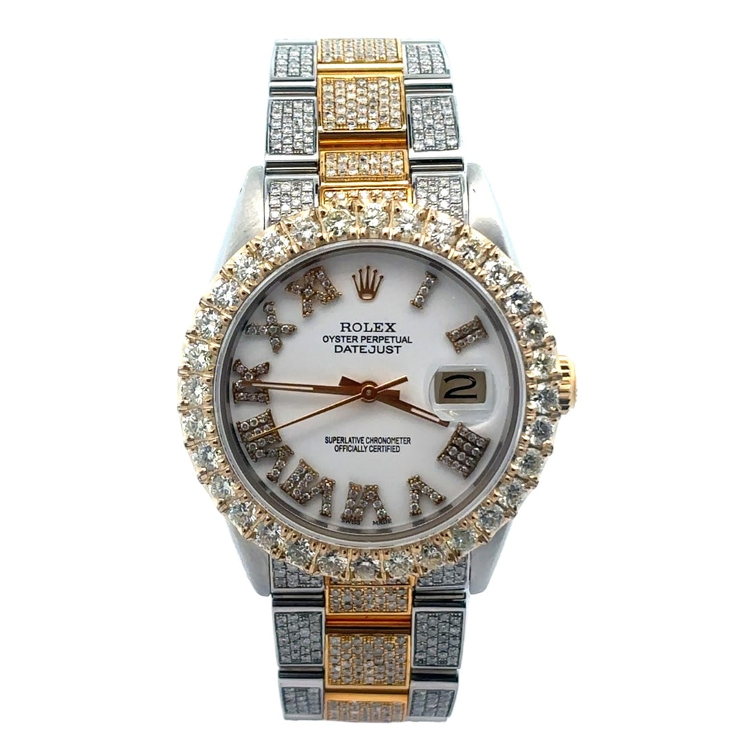 Rolex Datejust 36mm 16013 Two-Tone White Diamond Dial: The Rolex Datejust 36mm, Reference 16013, is a radiant expression of two-tone elegance. Crafted from a combination of stainless steel and 18K yellow gold, this pre-owned timepiece features a custom wh