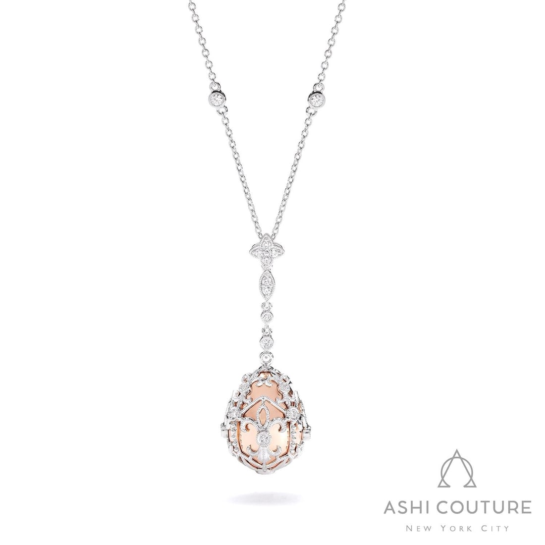0.59 ctw Diamond Mademoiselle Cage Drop 18K Rose & White Gold Pendant Necklace: An exquisite masterpiece of haute joaillerie, this breathtaking Cage Drop pendant necklace featuring White Diamond is a true treasure. A detailed Drop Pendant gallery secures the stones, rendered in 7