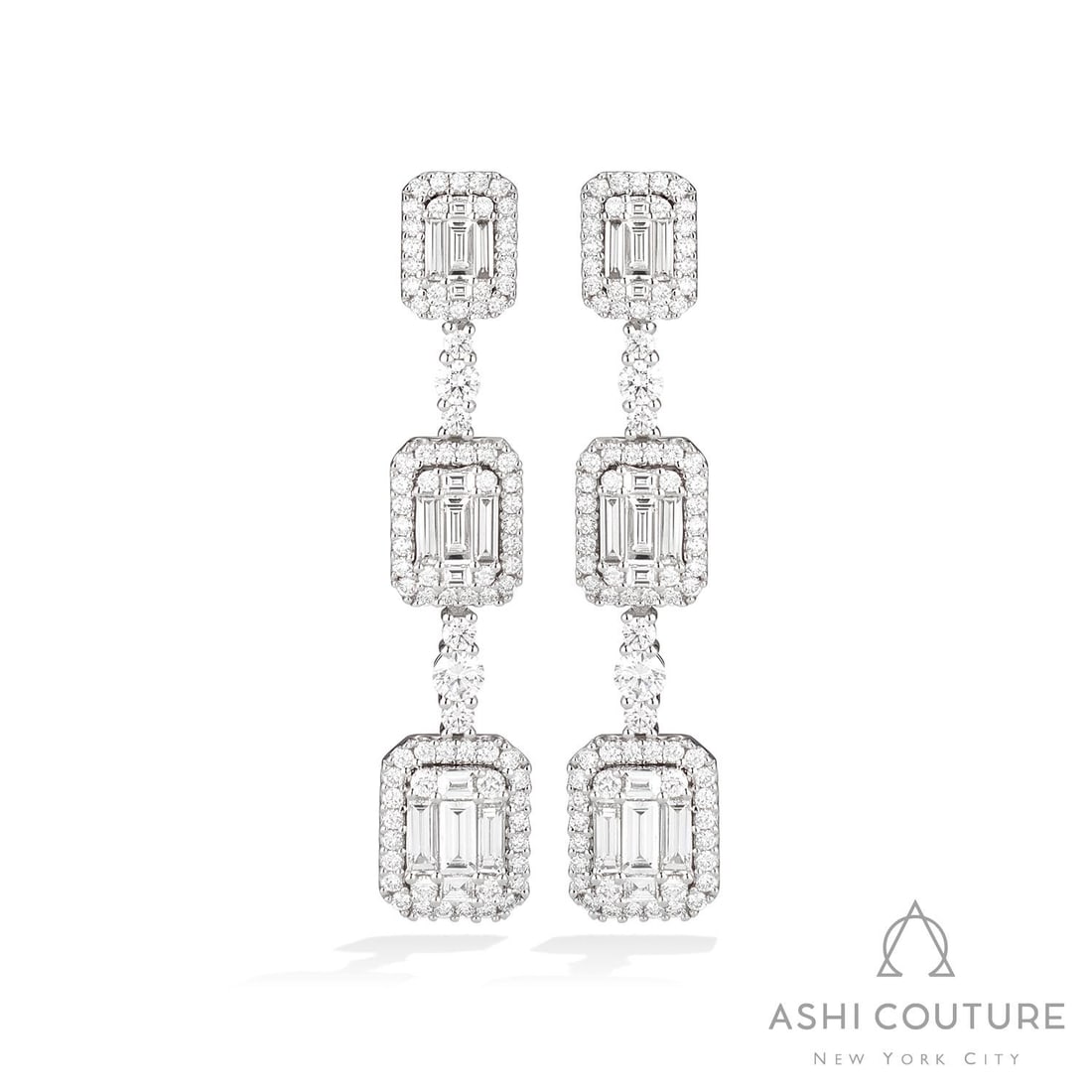 1.91 ctw Diamond Graduating Station 18K White Gold Drop Earrings: Epitomizing grandeur, this breathtaking Graduating Station pair of earrings featuring White Diamond stands as a beacon of refined taste. Showcasing the gems in a Halo arrangement, the earrings consist