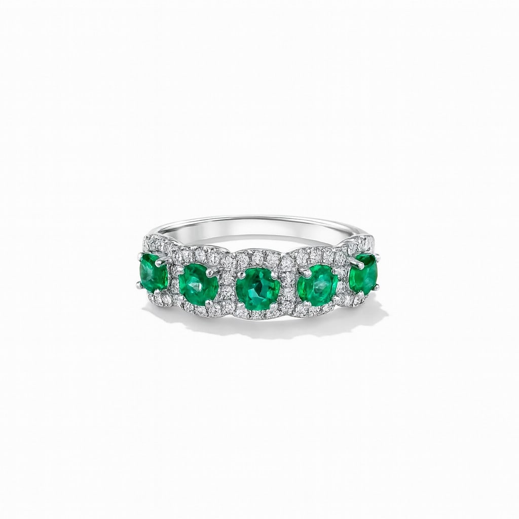 1.12ctw Emerald and 0.44ct Diamond 5 Stone Halo 14K White Gold Ring: Exuding opulence and grace, this magnificent 5 Stone Halo ring featuring Emerald, White Diamond is crafted for the distinguished. Crafted with precision, the Five-Stone Halo setting is seamlessly inte