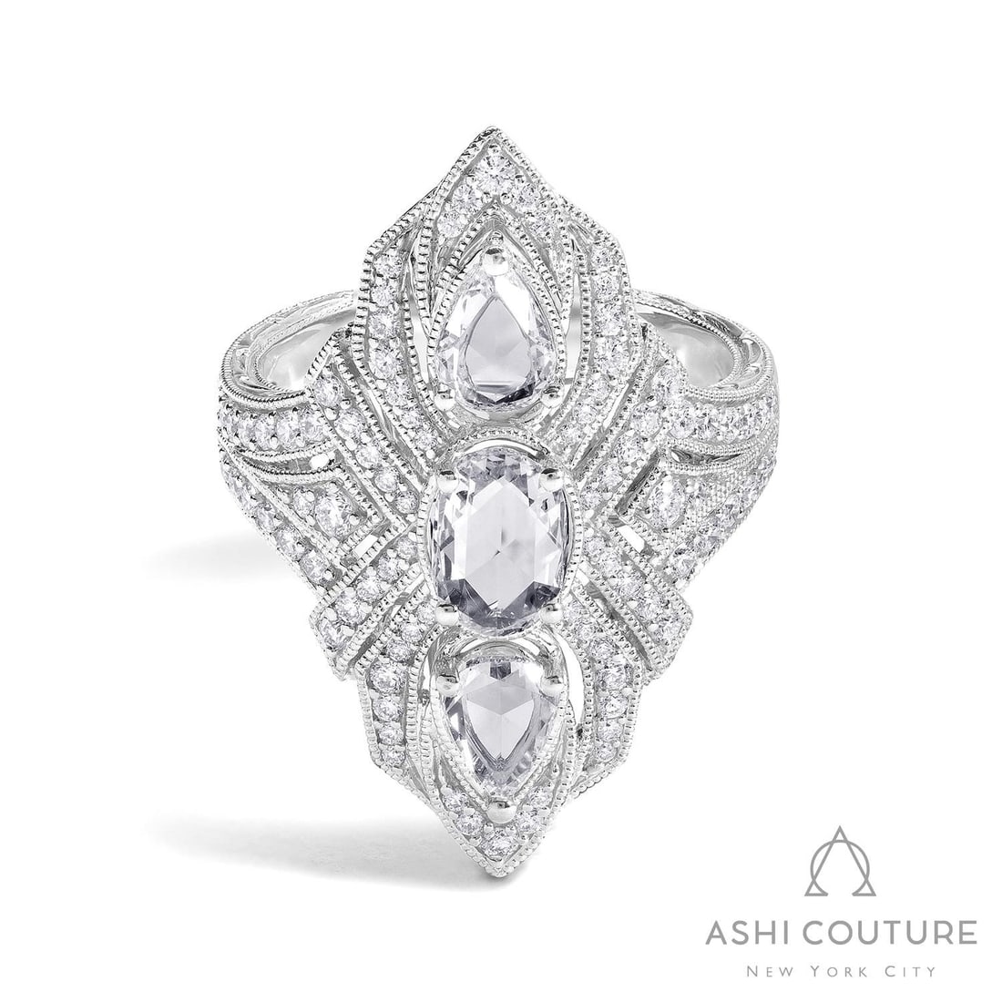 2.13 ctw Vintage Mademoiselle Diamond Cluster 18K White Gold Ring: Captured in a moment of brilliance, this exquisite Vintage ring featuring Natural Diamonds speaks to the connoisseur. Expertly mounted in an Elongated Cluster setting, the ring is crafted in 9.95 gram