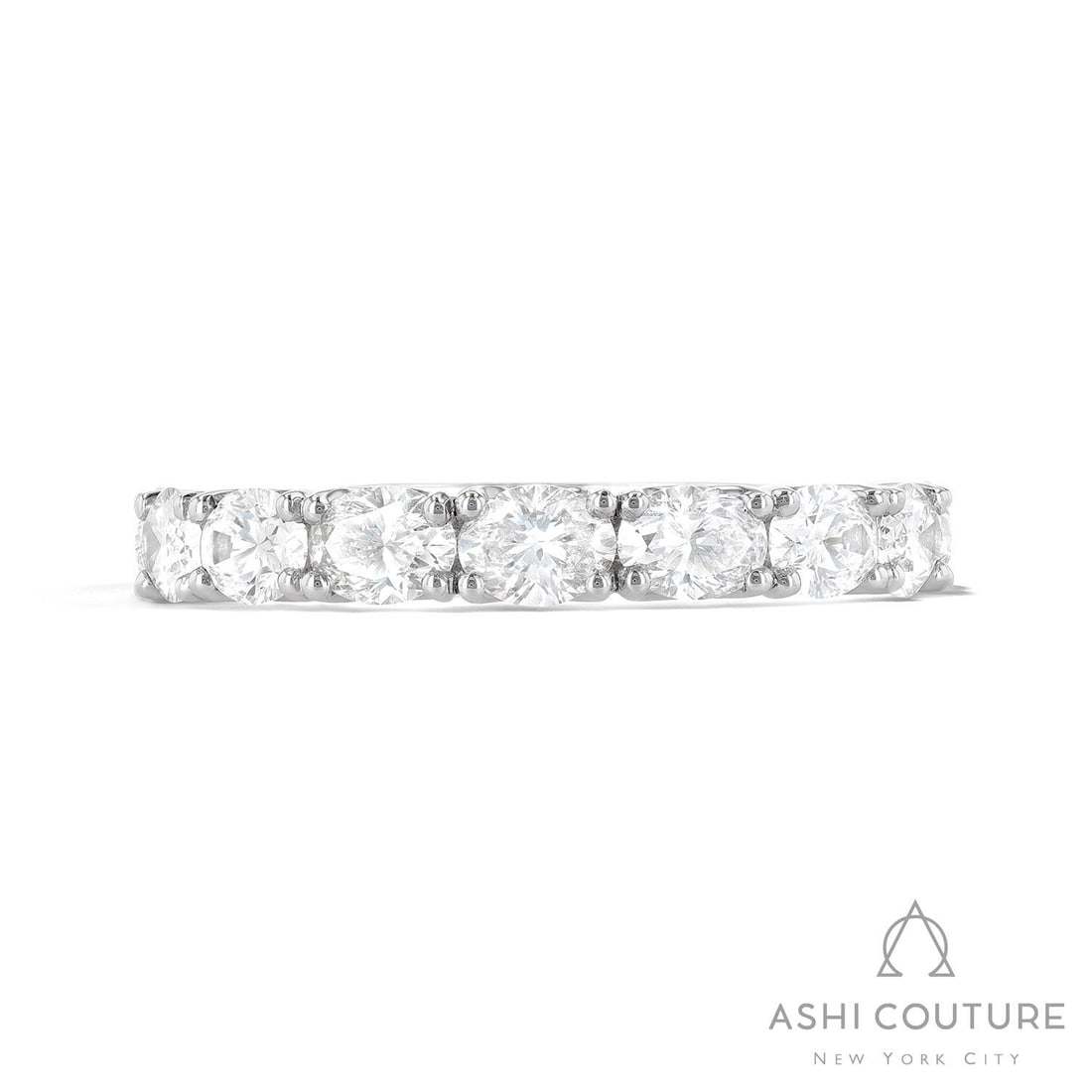 1.71 ctw Oval Diamond East-West 18K White Gold Band Ring: Captured in a moment of brilliance, this breathtaking East-West ring featuring White Diamonds speaks to the connoisseur. The gemstones are nestled within a Halfway Band framework, supported by a subst