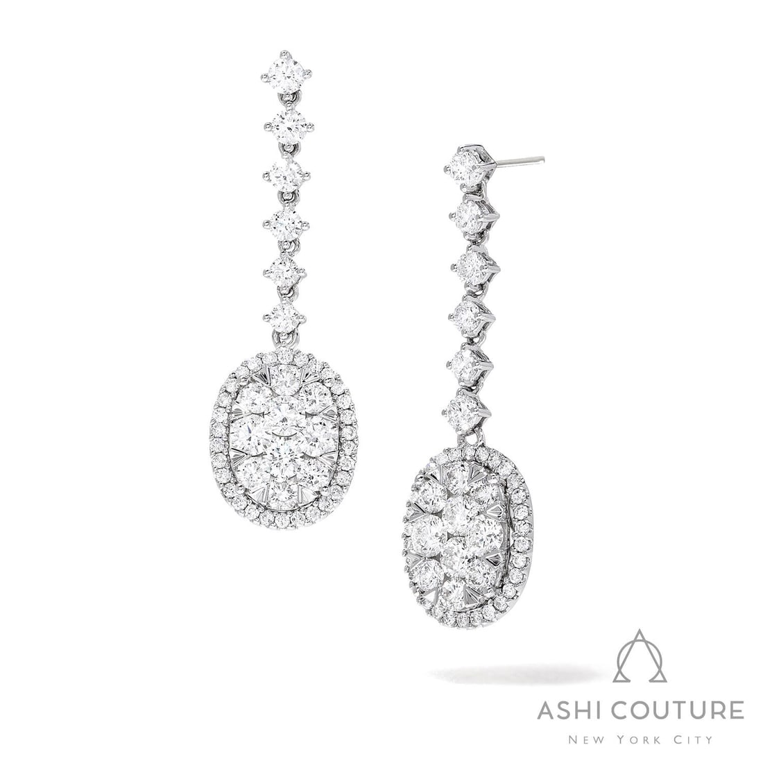 3.96 ctw Diamond Fiori Oval Drop Cluster 18K White Gold Earrings: A testament to superior craftsmanship, this breathtaking Fiori Oval Drop Cluster pair of earrings featuring Natural Diamonds is unparalleled. A detailed Halo gallery secures the stones, rendered in 8.
