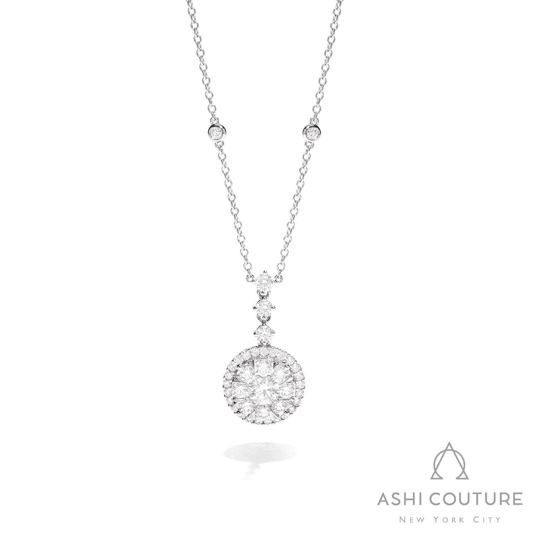 2.35 ctw Diamond Drop Cluster Pendant 18K White Gold Necklace: Defining modern elegance, this stunning Drop Cluster necklace featuring White Diamond captures the essence of style. Securely held in a classic Halo design, the necklace is forged from 4.4 g of high-p