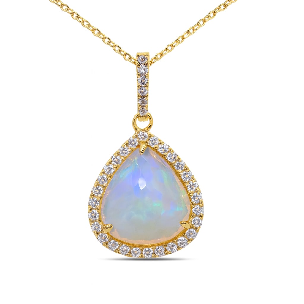 3.44ct Opal and 0.29ctw Diamond 14K Yellow Gold Pendant: An exquisite masterpiece of haute joaillerie, this stunning Halo pendant featuring Opal, White Diamond is a true treasure. Showcasing the gems in a Halo arrangement, the pendant consists of 1.94 grams