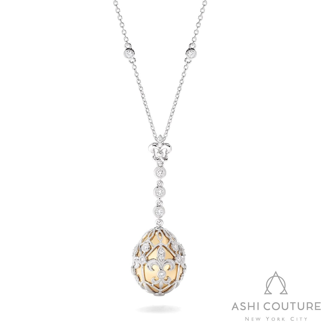 0.69 ctw White Diamond 18K Yellow & White Gold Pendant: Exuding opulence and grace, this luxurious Cage Drop pendant featuring Natural Diamonds is crafted for the distinguished. A detailed Drop Pendant with Cage Structure gallery secures the stones, render
