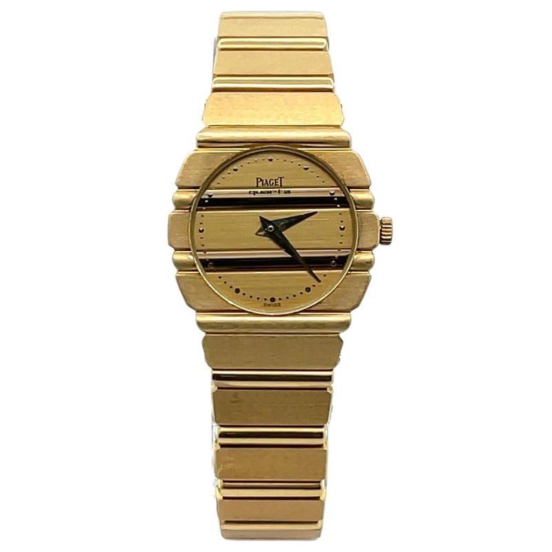 Audemars Piguet 861C701 18K Gold Champagne Dial: The Audemars Piguet, Reference 861C701, is an exquisite expression of timeless elegance. Crafted in radiant 18K gold, this ladies' timepiece showcases a luminous Champagne dial that captures the l