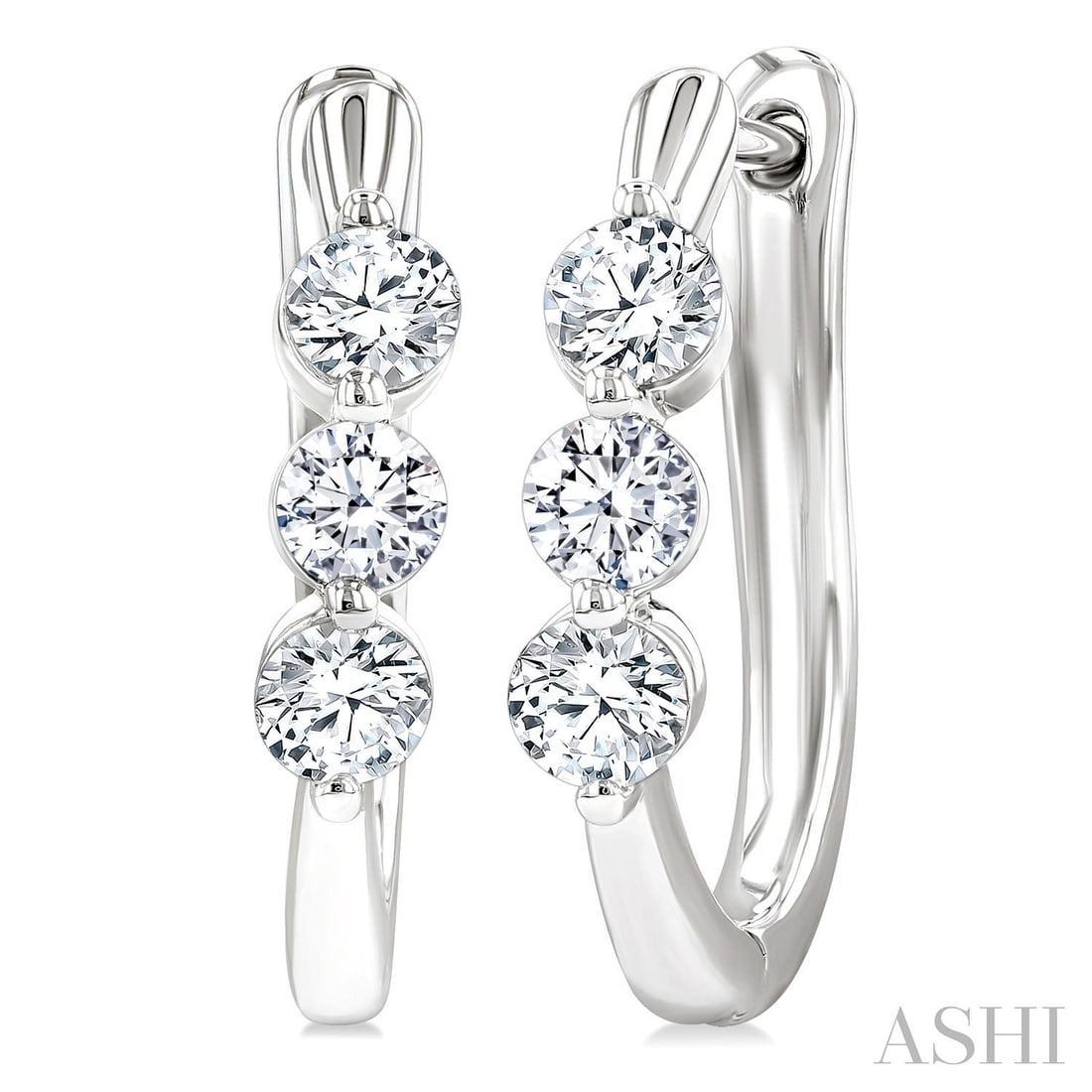 0.76 ctw Three-Stone Diamond 14K White Gold Hoop Earrings: Defining modern elegance, this stunning Three-Stone pair of earrings featuring Natural Diamonds captures the essence of style. The gemstones are nestled within a Three-Stone framework, supported by a 