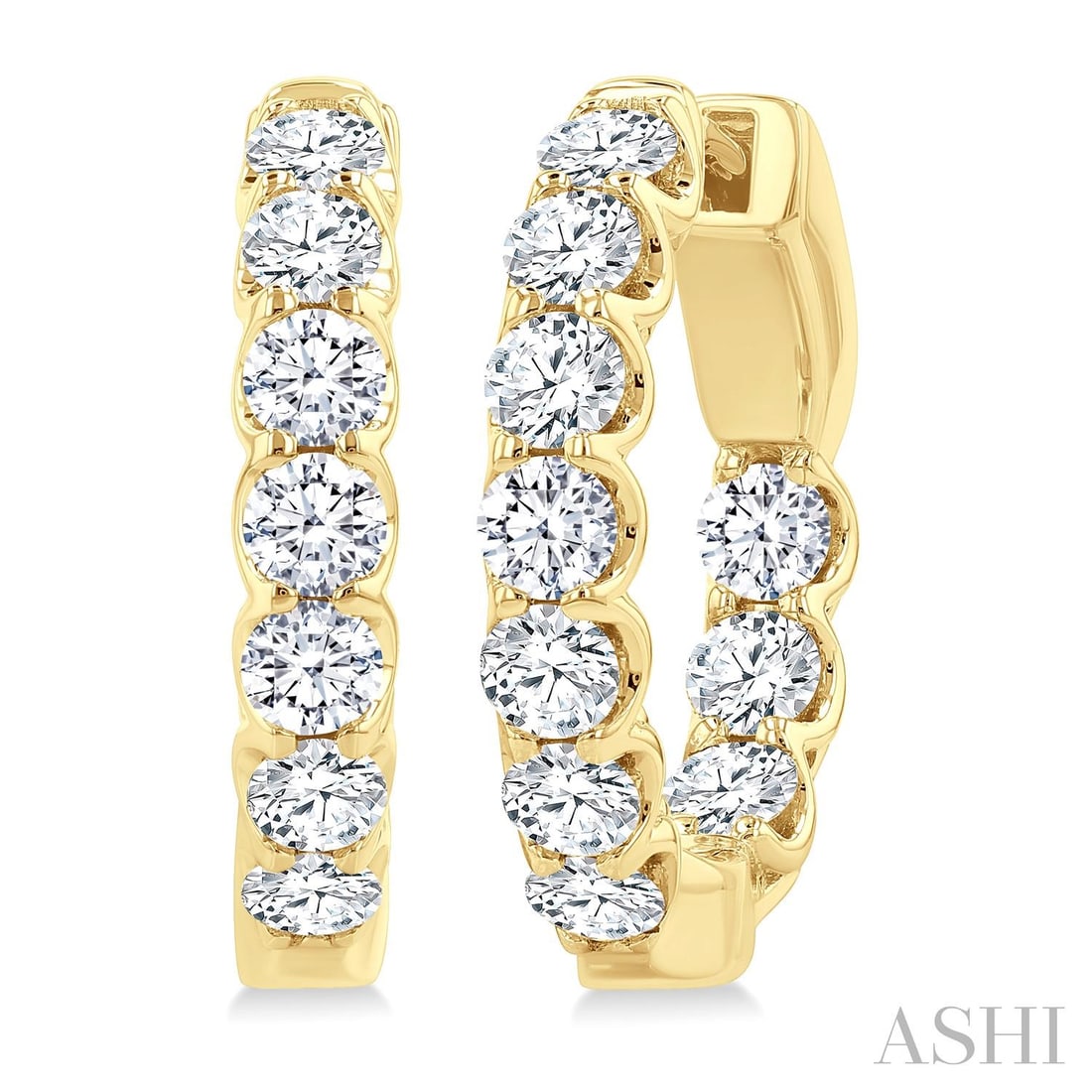 2.00 ctw Inside-Out Diamond 14K Yellow Gold Hoop Earrings: Defining modern elegance, this stunning Inside-Out Hoop pair of earrings featuring White Diamond captures the essence of style. The gemstones are nestled within a Shared Prong framework, supported by 