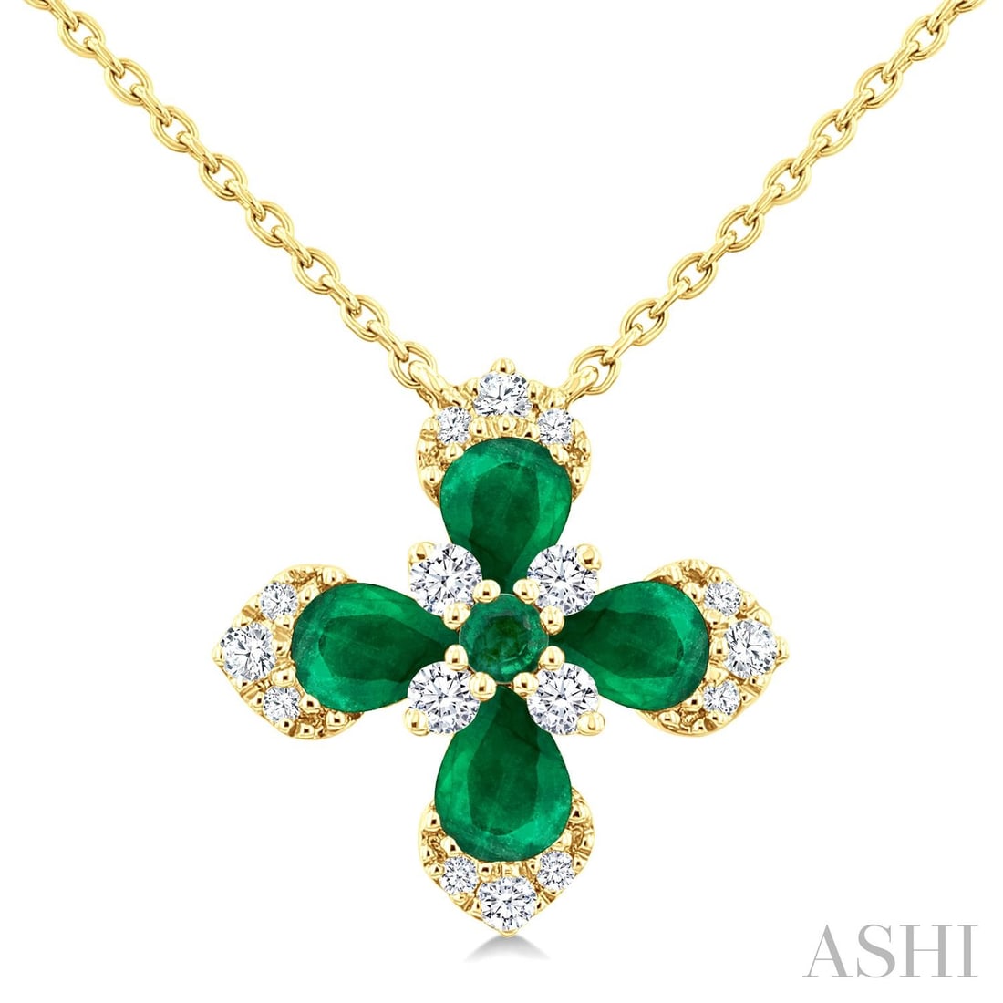Emerald and 0.16 ctw Diamond 14K Yellow Gold Pendant Necklace: Defining modern elegance, this exquisite Floral Blossom pendant necklace featuring Emerald, White Diamond captures the essence of style. Securely held in a classic Cluster design, the pendant necklace