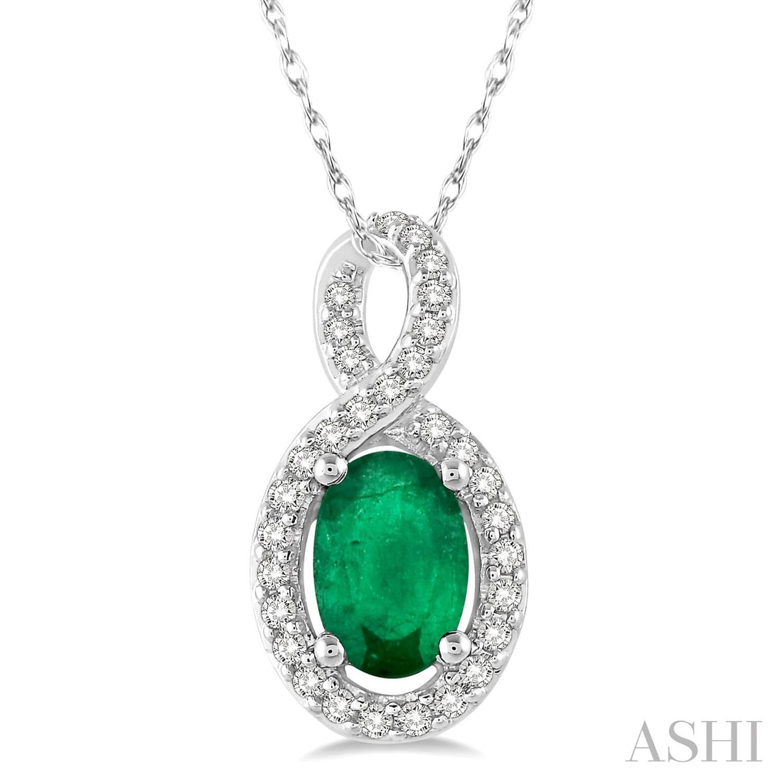 6x4mm Oval Emerald and 0.10 ctw Diamond 10K White Gold Pendant: Timeless and sophisticated, this elegant Halo pendant featuring Emerald, White Diamond radiates enduring beauty. Securely held in a classic Halo design, the pendant is forged from 1.05 grams of high-p