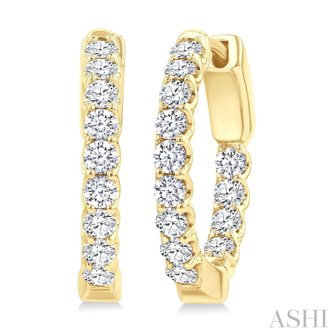 1.03 ctw White Diamond Inside-Out Hoop 14K Yellow Gold Earrings: Exuding opulence and grace, this breathtaking Inside-Out Hoop pair of earrings featuring White Diamond is crafted for the distinguished. Showcasing the gems in a Inside-Out Hoop arrangement, the earri