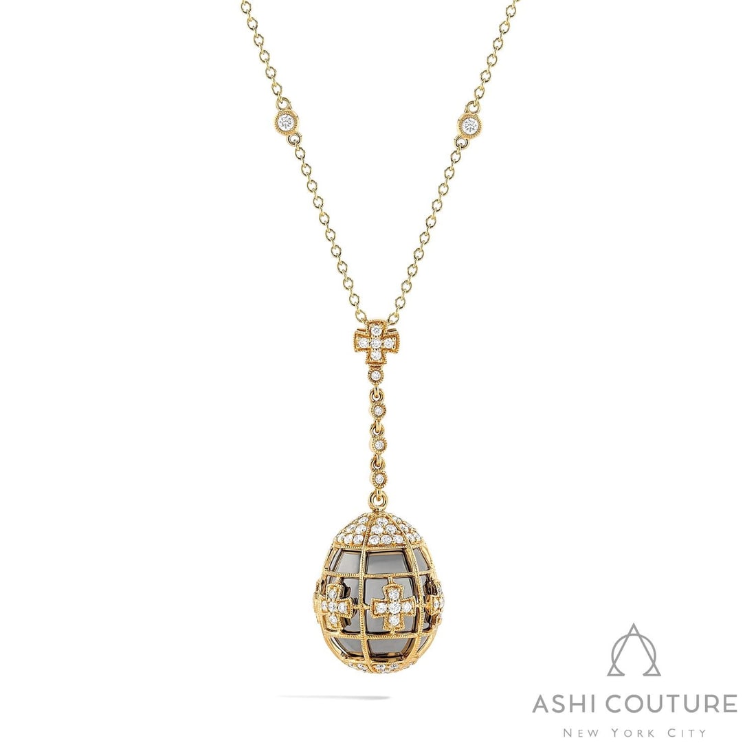 1.31 ctw White Diamond Mademoiselle Cage Drop 18K Yellow & White Gold Pendant Necklace: A symphony of light and color, this breathtaking Cage Drop necklace featuring Natural Diamonds embodies the pinnacle of luxury. Expertly mounted in a Cage/Drop setting, the necklace is crafted in 6.9 