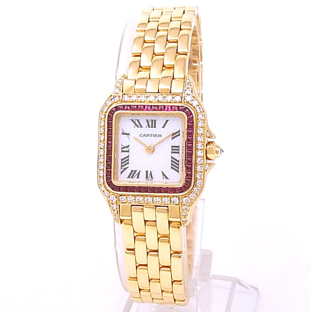 Cartier Panthere WF3237B9 18K Yellow Gold Diamond Ruby Mother-of-Pearl Dial: The Cartier Panthere, Reference WF3237B9, is an exquisite union of fine jewelry and horological elegance. Crafted entirely in 18k yellow gold, the case and bracelet illuminate a sublime mother-of-pear