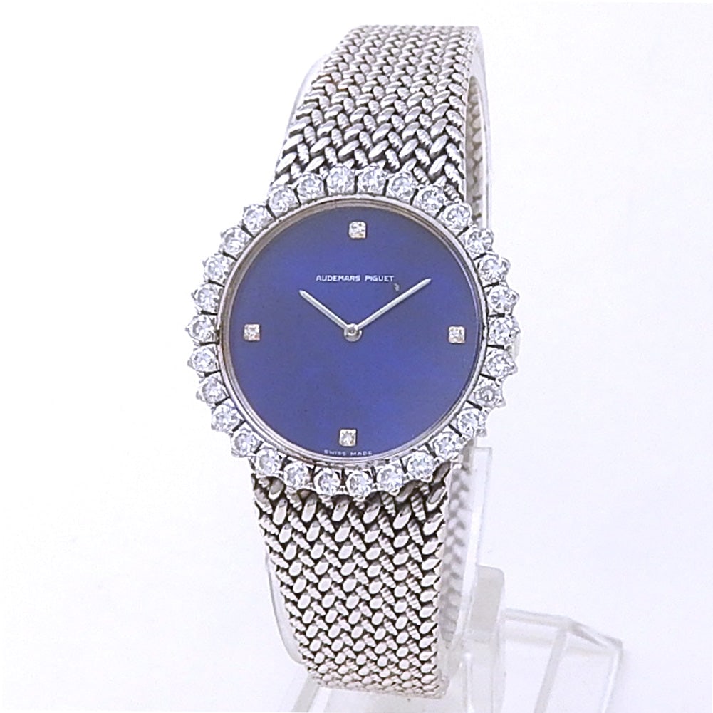 Audemars Piguet Vintage 18k White Gold Diamond Blue Dial Ladies Watch: The Audemars Piguet Vintage Ladies Watch captures the essence of classic horological elegance. Crafted in stunning 18K white gold, this exquisite timepiece features a captivating blue dial adorned