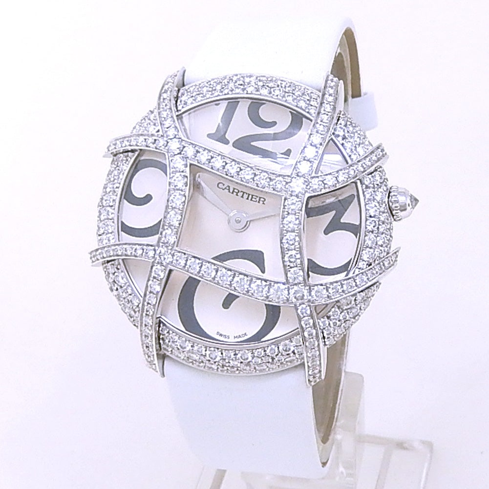Cartier Ronde Folle 2991 18k White Gold Silver Dial: The Cartier Ronde Folle, Reference 2991, is an extraordinary expression of whimsical asymmetry and fine watchmaking. Cast in lustrous 18k white gold, the fluid, organic lines of the case frame a prist