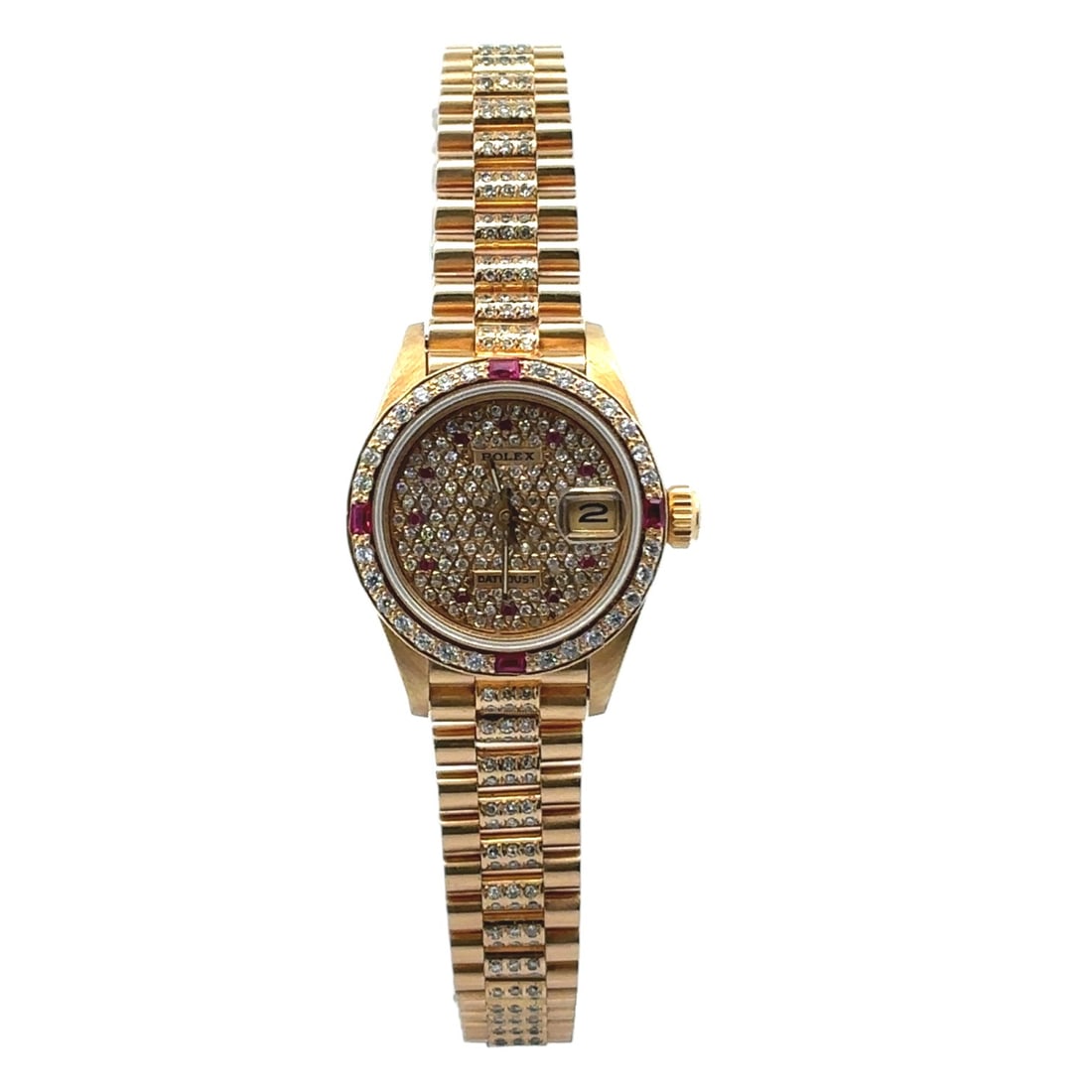 Rolex Datejust 69178 18K Yellow Gold Diamond Ruby Dial 26mm: The Rolex Datejust, Reference 69178, is a stunning example of vintage elegance. Crafted in 18K yellow gold, this 1970 masterpiece features a mesmerizing Champagne dial adorned with custom-set diam