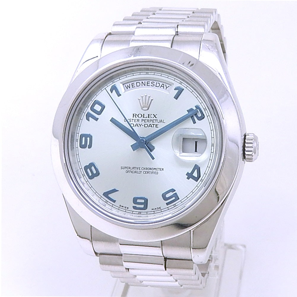 Rolex Day-Date II 218206 Platinum Ice Blue Dial: The Rolex Day-Date II, Reference 218206, is a remarkable expression of prestige. Housed in a solid Platinum case, this timepiece features a captivating Ice Blue dial, a hue reserved exclusively fo
