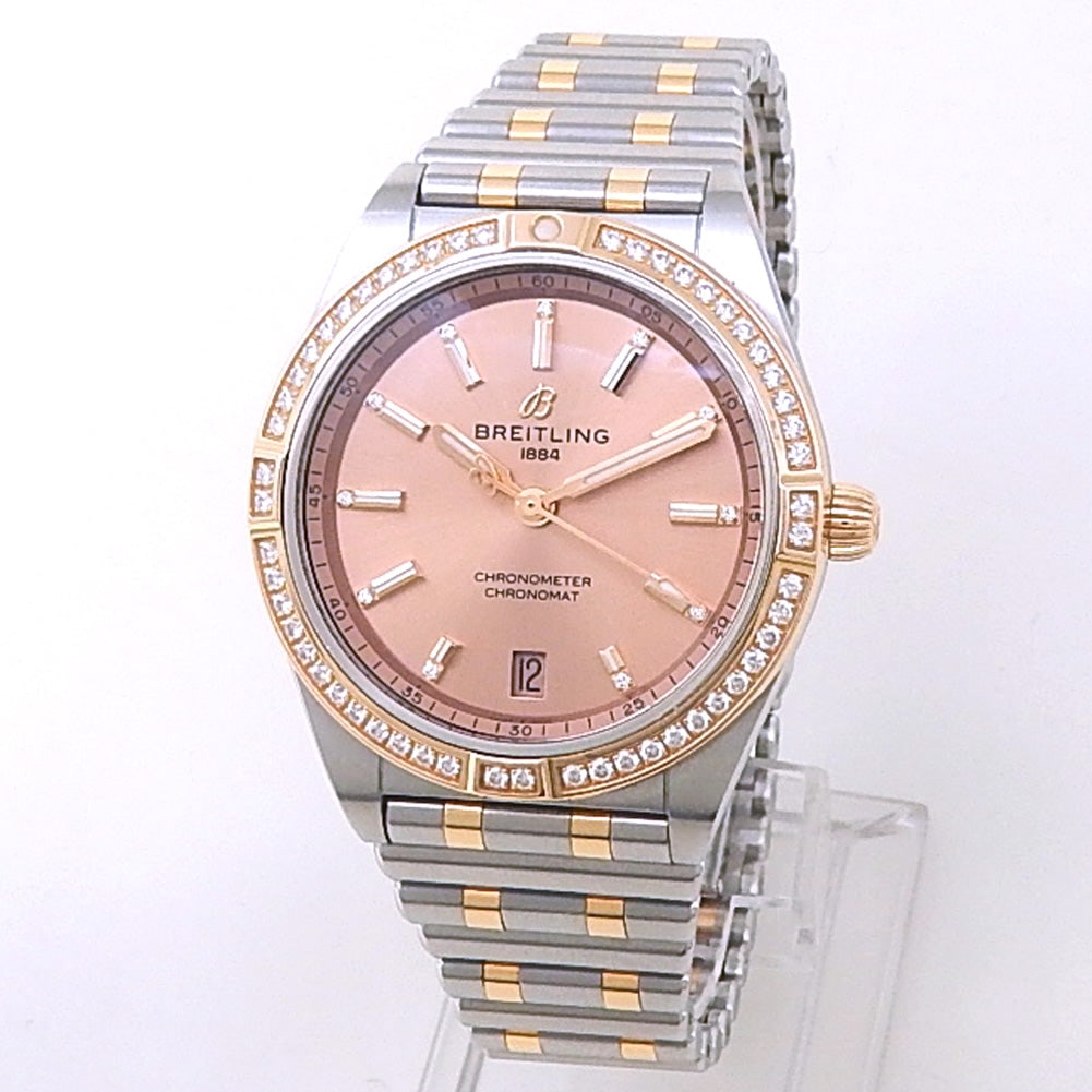 Breitling Chronomat Automatic 36 U10380 Rose Gold Steel Bronze Dial: The Breitling Chronomat Automatic 36, Reference U10380, is a superb expression of sporty elegance and modern luxury. Masterfully crafted from a striking combination of 18k rose gold and stainless stee