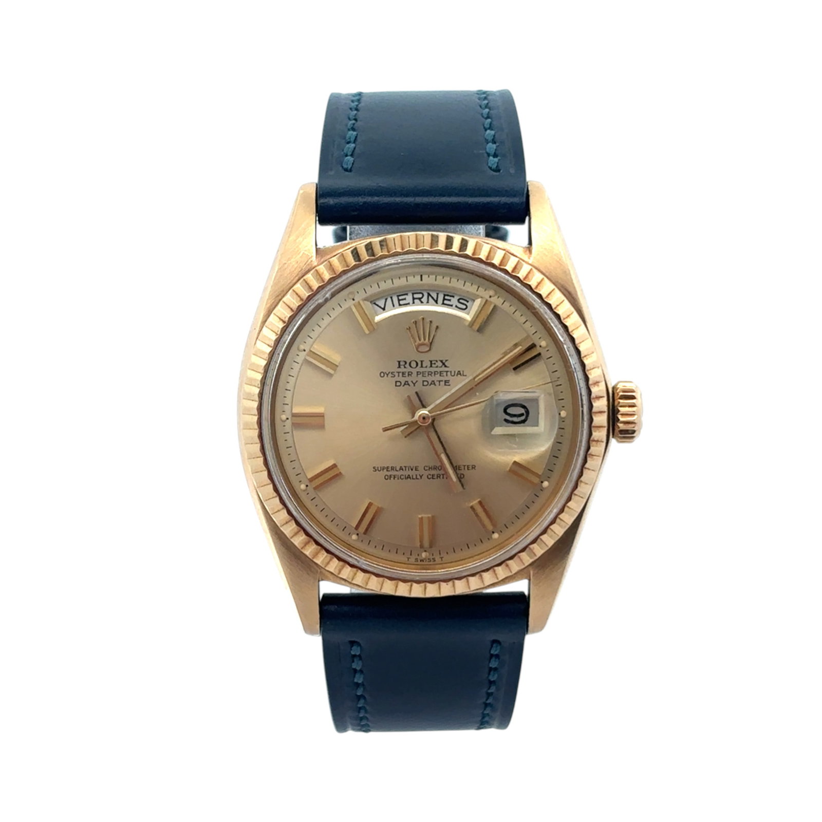 Rolex Day-Date 36mm Gold President 1803 Champagne Stick Dial: The Rolex Day-Date, Reference 1803, is crafted in 18K yellow gold and features a stunning champagne dial with applied stick hour markers that exudes timeless elegance. The iconic fluted be