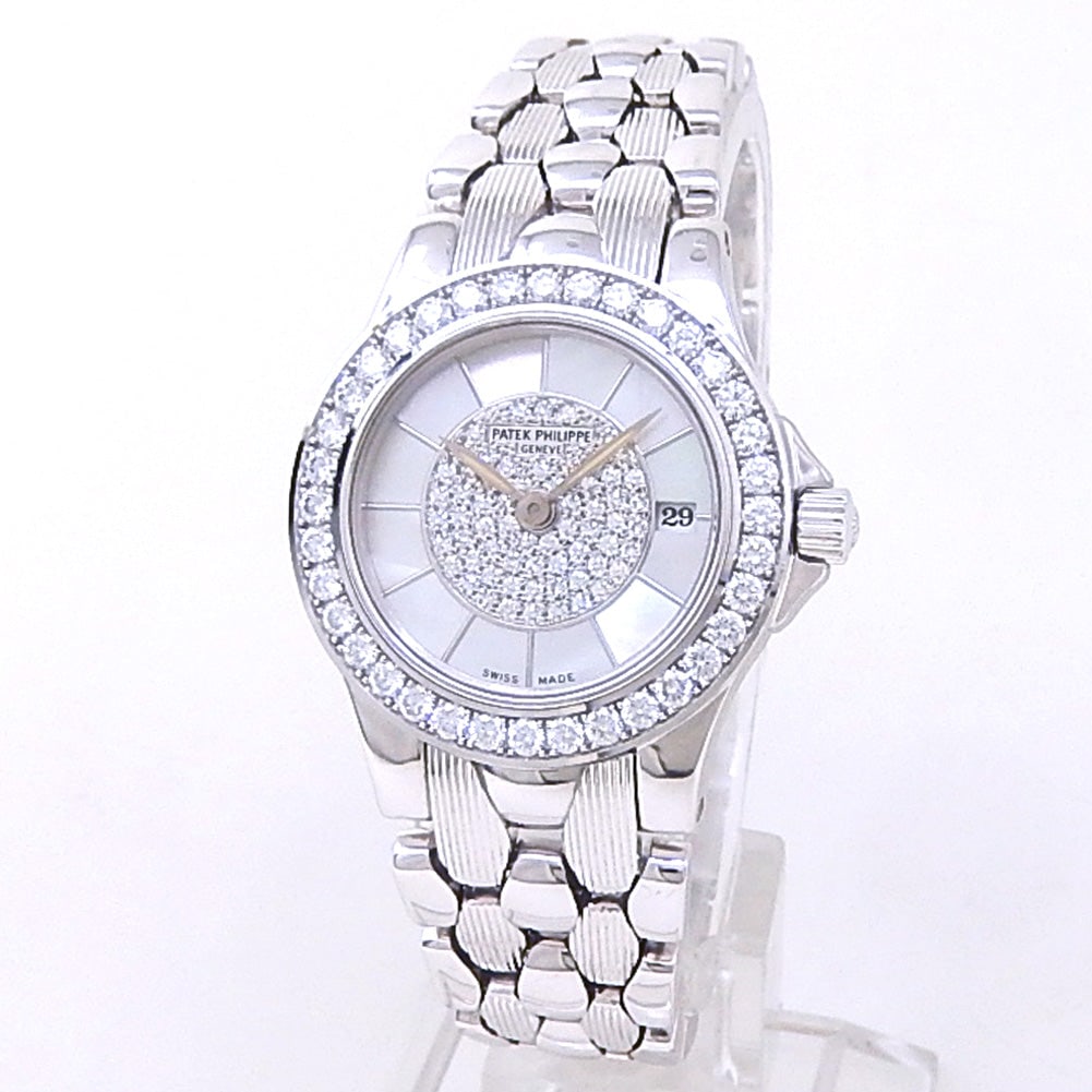 Patek Philippe Neptune 4881/110G White Gold Mother of Pearl Diamond Dial: The Patek Philippe Neptune, Reference 4881/110G, is an exceptional combination of high jewelry craftsmanship and refined watchmaking. Cast in lustrous 18k white gold, this elegant ladies' timepiece sh