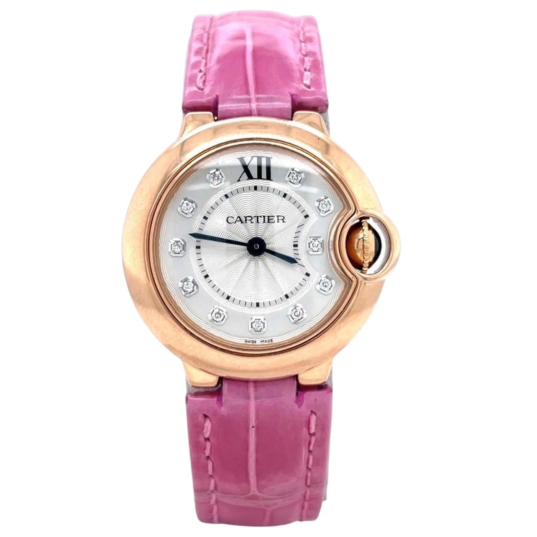 Cartier Ballon Bleu 28mm 18K Rose Gold MOP Diamond Dial WE902050: The Cartier Ballon Bleu, Reference WE902050, is an exquisite expression of luxury and feminine grace. Crafted in 18K rose gold, this timepiece features a captivating mother-of-pearl dial adorned w