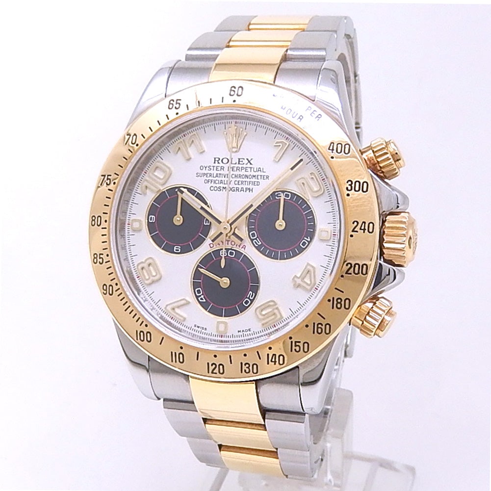 Rolex Daytona 116523 18k Yellow Gold Stainless Steel Silver Panda Dial: The Rolex Daytona, Reference 116523, is an exquisite fusion of precious metal and robust steel. Crafted in a striking combination of 18k yellow gold and stainless steel, this timepiece features a capt