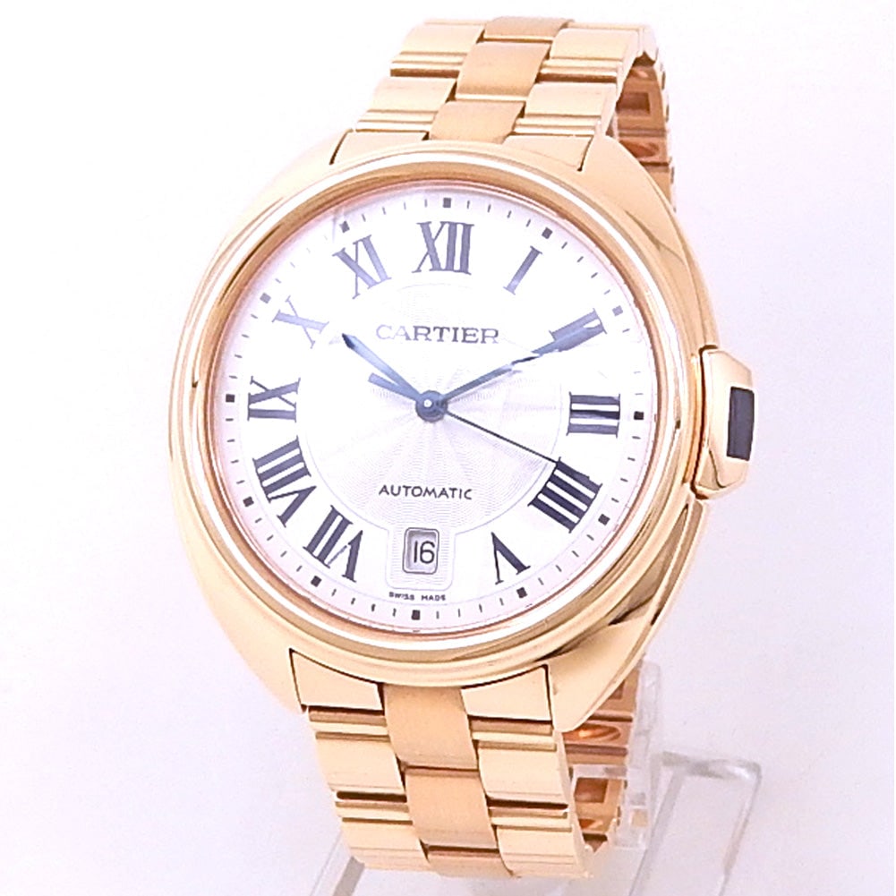 Cartier Cle de Cartier WGCL0002 18k Rose Gold Silver Dial: The Cartier Clé de Cartier, Reference WGCL0002, represents an elegant evolution in luxury watchmaking. Expertly cast in 18k Rose Gold, this exquisite timepiece is defined by its gently curved, 