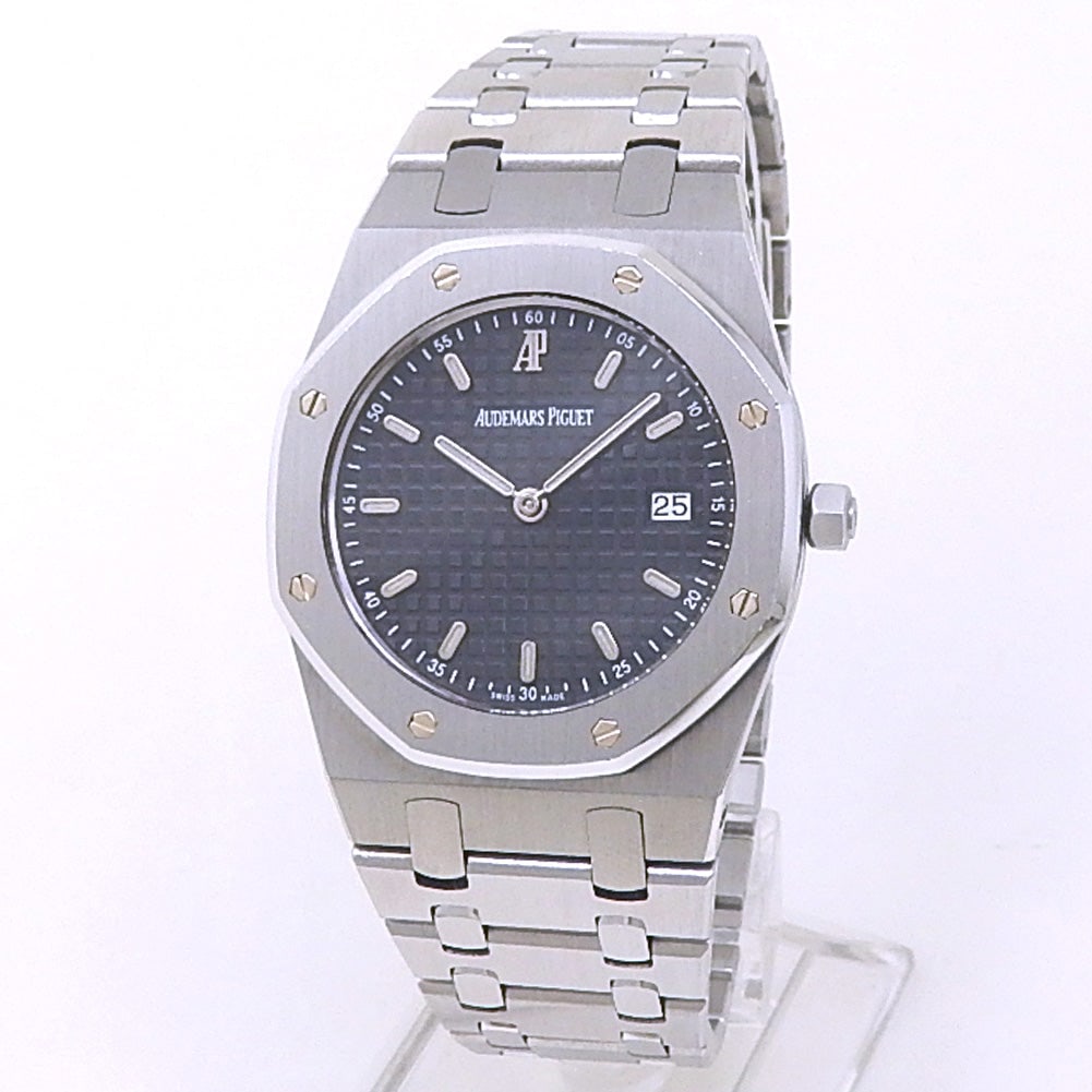 Audemars Piguet Royal Oak 56175ST Steel Black Dial: The Audemars Piguet Royal Oak, Reference 56175ST.OO.0789ST.07, is a masterclass in sport-luxury horology. Crafted in durable stainless steel, this elegant ladies' timepiece features a sleek black dial