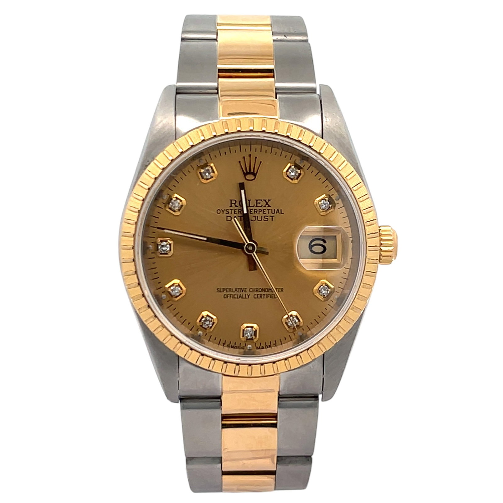 Rolex Oyster Perpetual Date Ref. 15223 Steel & 18K Gold Champagne Diamond Dial: The Rolex Oyster Perpetual Date, Reference 15223, is a captivating blend of robust steel and warm gold. Its 34mm two-tone Oyster case is meticulously crafted from 904L stainless steel and 18k yellow g