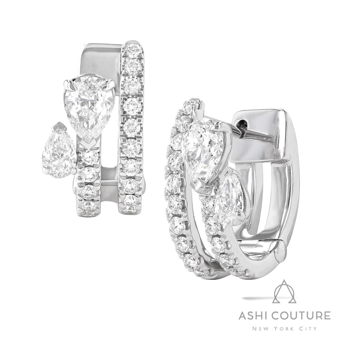 1.16 ctw Paradox Pear Diamond 18K White Gold Hoop Earrings: Captured in a moment of brilliance, this stunning Paradox Pear 2-Row pair of earrings featuring Natural Diamonds speaks to the connoisseur. The gemstones are nestled within a Hoop framework, supported